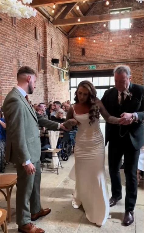 Emotional moment disabled bride walks down the aisle